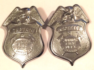Jr. LAFD badges. Captain on the left and an inspector on the right. 